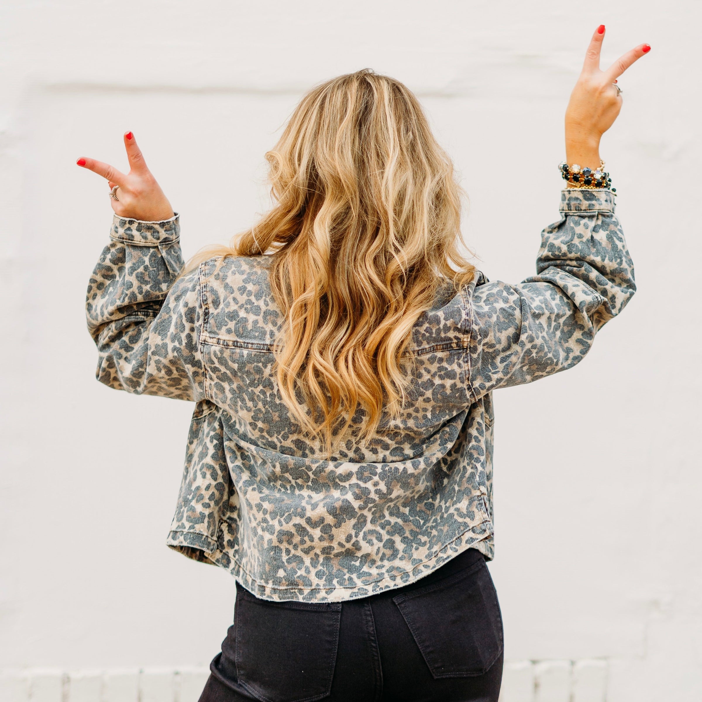Coral blouse holding Flowers