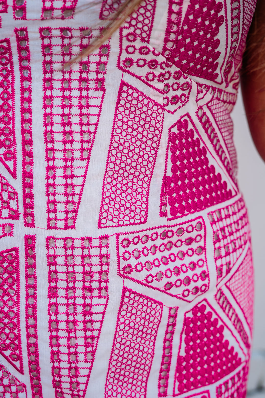 Jade: V-Neck Empire Dress in Empire in Fuchsia Geo Eyelet