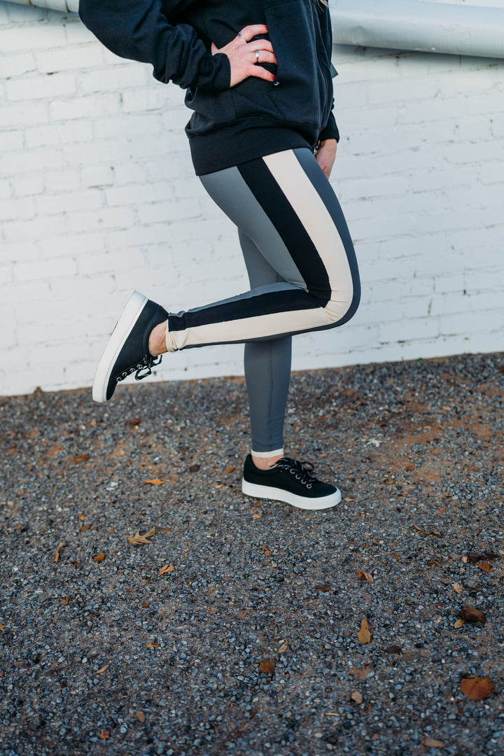 Glyder: Directional Legging in Carbon, Oatmilk, and Black