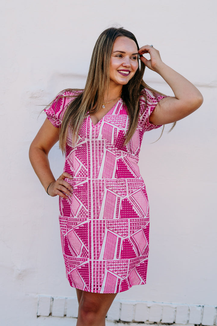 Jade: V-Neck Empire Dress in Empire in Fuchsia Geo Eyelet