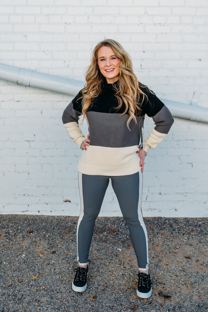 Glyder: Directional Legging in Carbon, Oatmilk, and Black