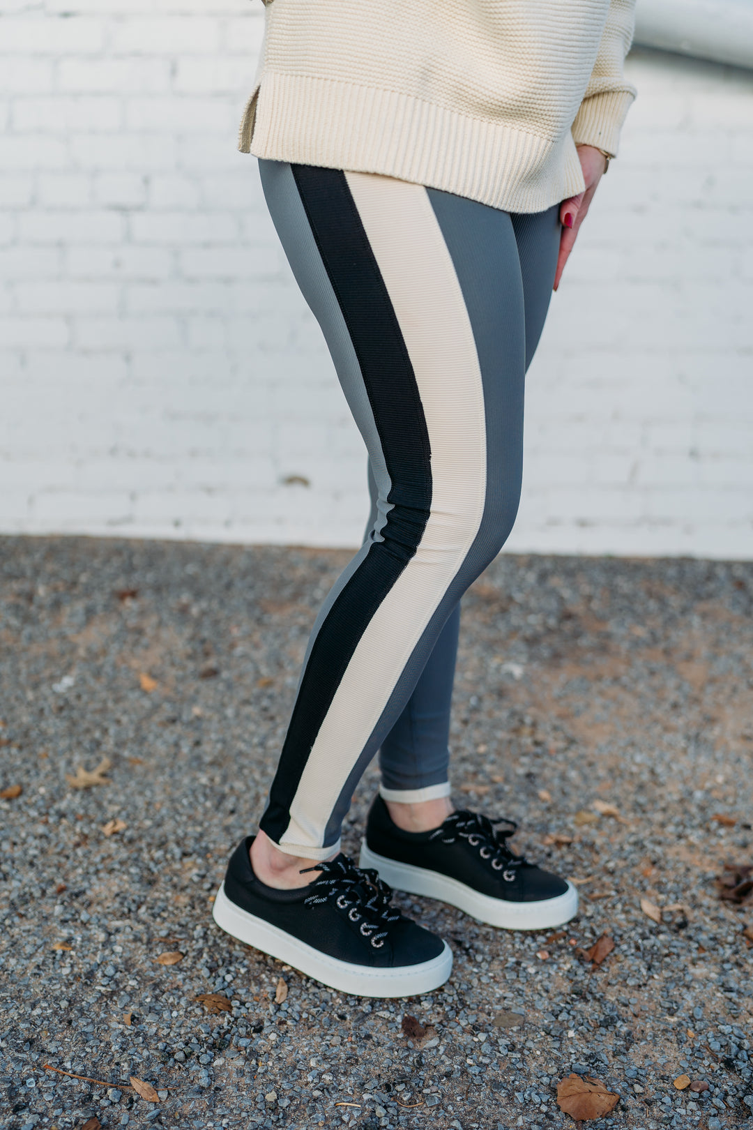 Glyder: Directional Legging in Carbon, Oatmilk, and Black