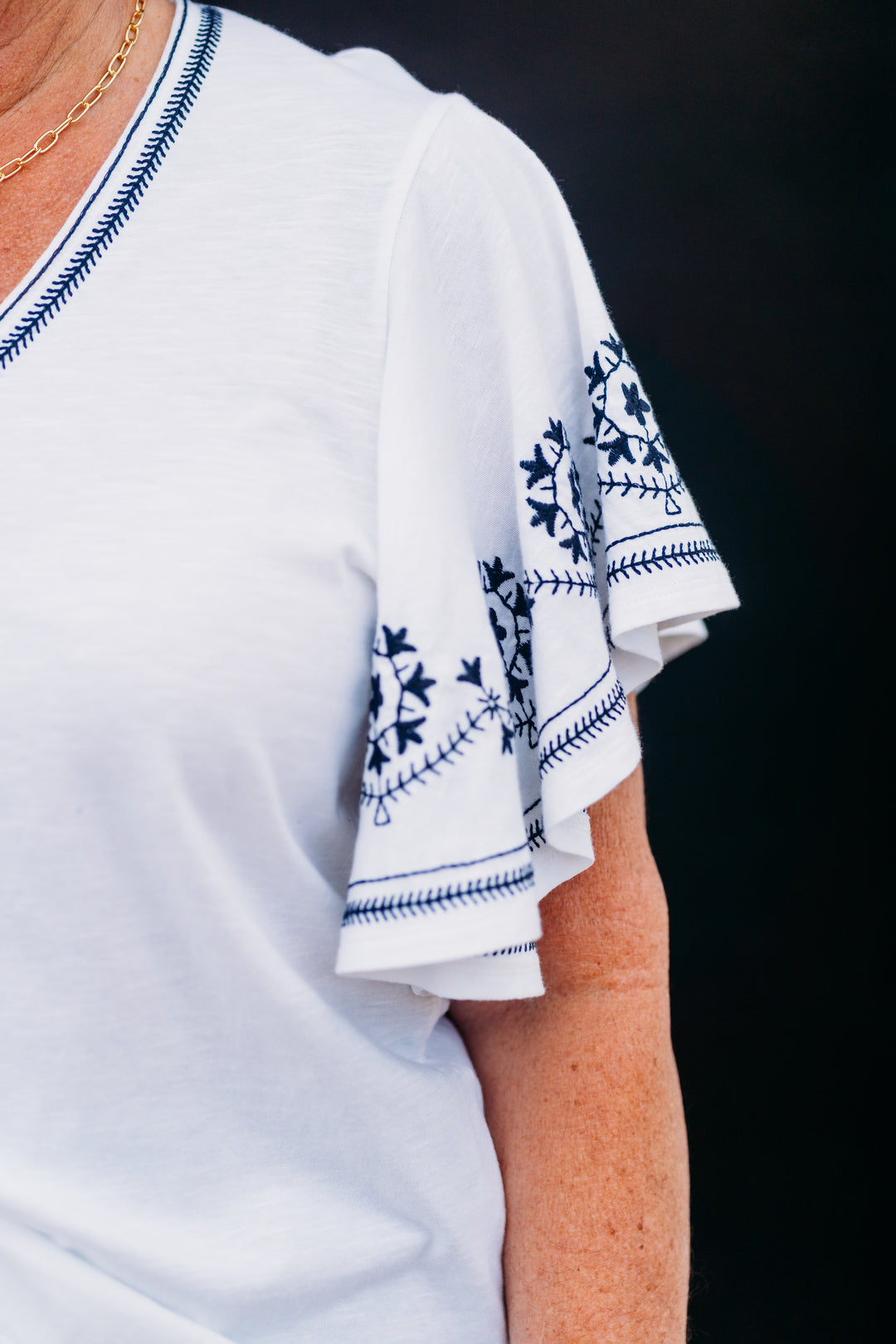 Karen Kane: Embroidered Flutter Sleeve Top in Off White