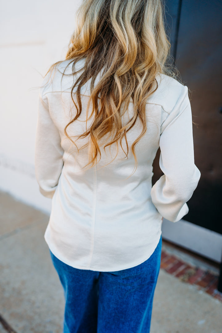 Karen Kane: Satin Side Pleat Shirt in Cream