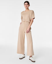 Load image into Gallery viewer, Spanx: AirEssentials Crop Wide Leg Jumpsuit in Tahini
