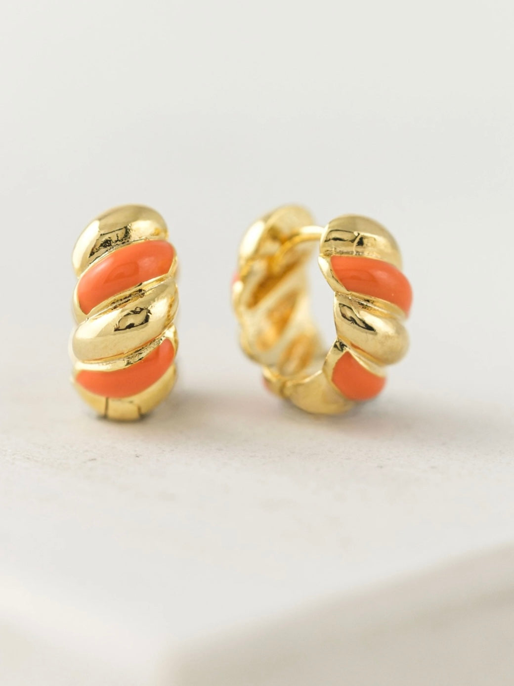 Lovers Tempo: Croissant Enamel Huggie Hoops Earrings in Gold/Orange