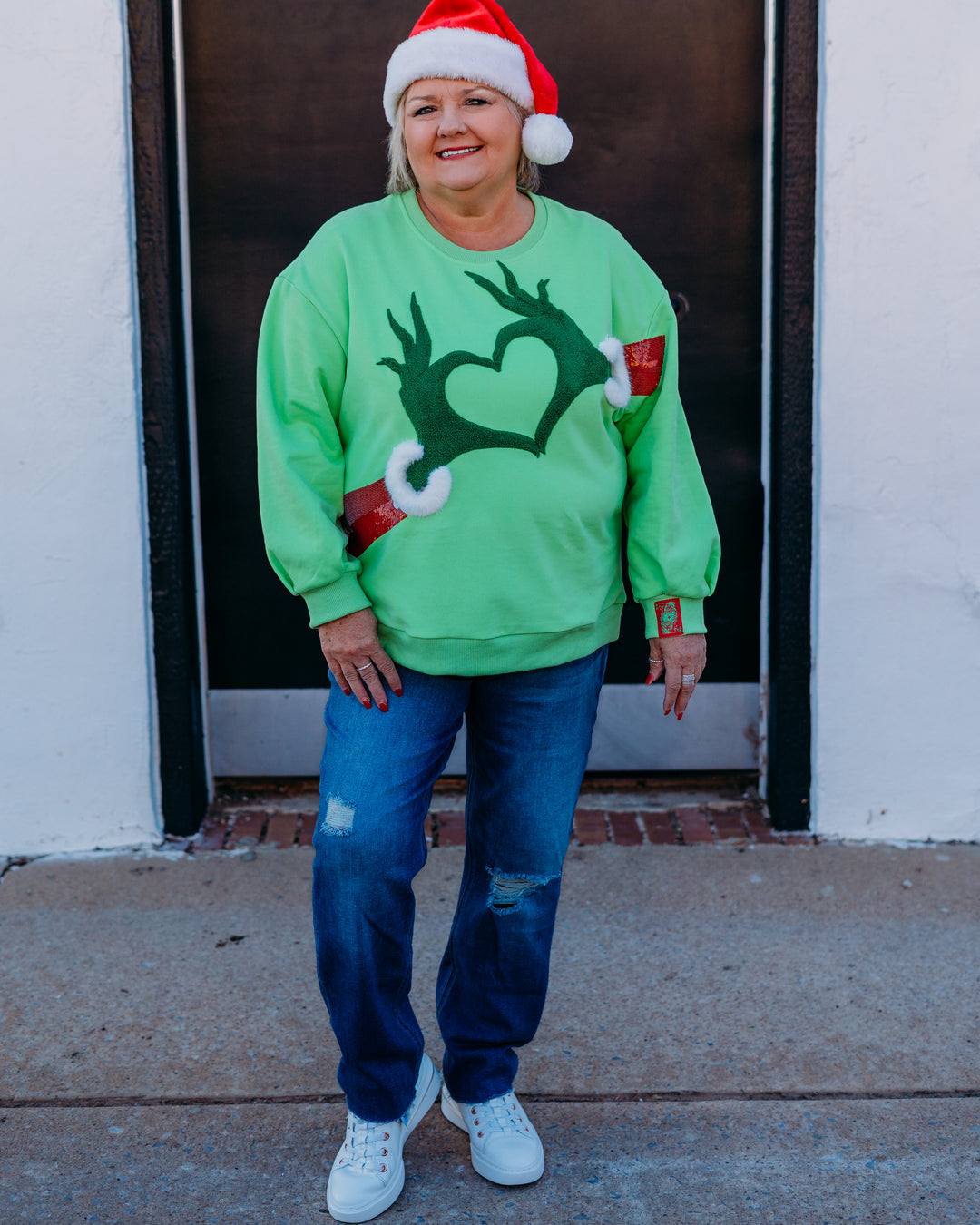 Queen Of Sparkles:Green Grinch Heart Hands Sweatshirt