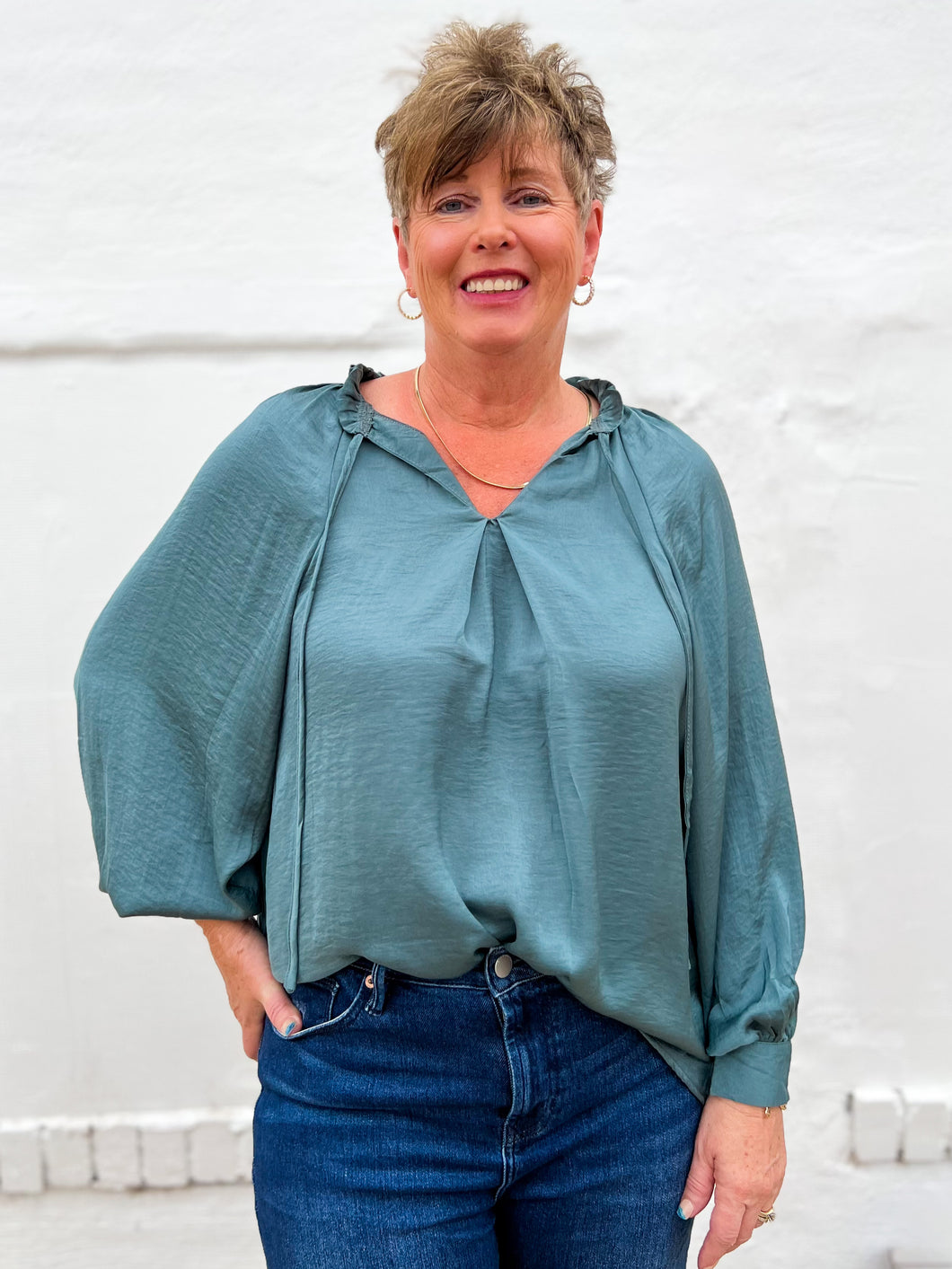Glam: Tie Front Ruffled Blouse in Teal