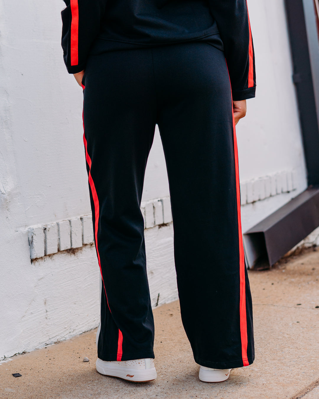 Jodifil: Track Pant in Black, Red, and Black
