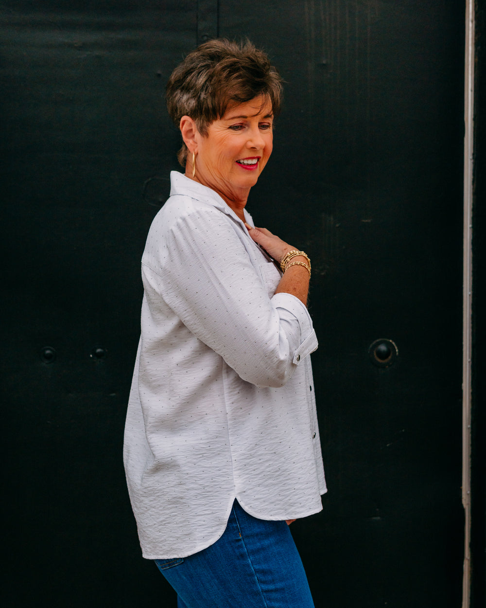 Multiples: Crunch Tab 3/4 Sleeve 2-Pocket Button Front High-Low Shirt in White - The Vogue Boutique