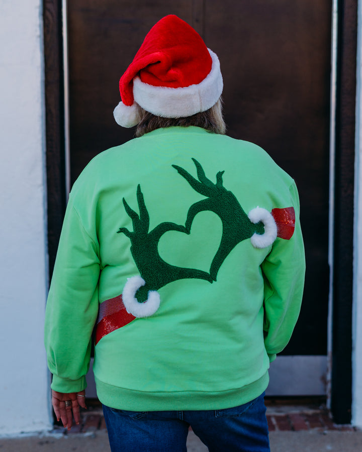 Queen Of Sparkles:Green Grinch Heart Hands Sweatshirt