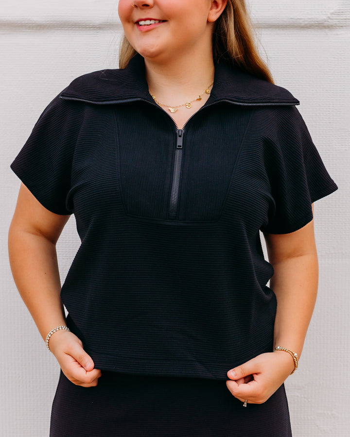 Spanx: Airessentials French Rib Short Sleeve Half Zip in Very Black (22483R)