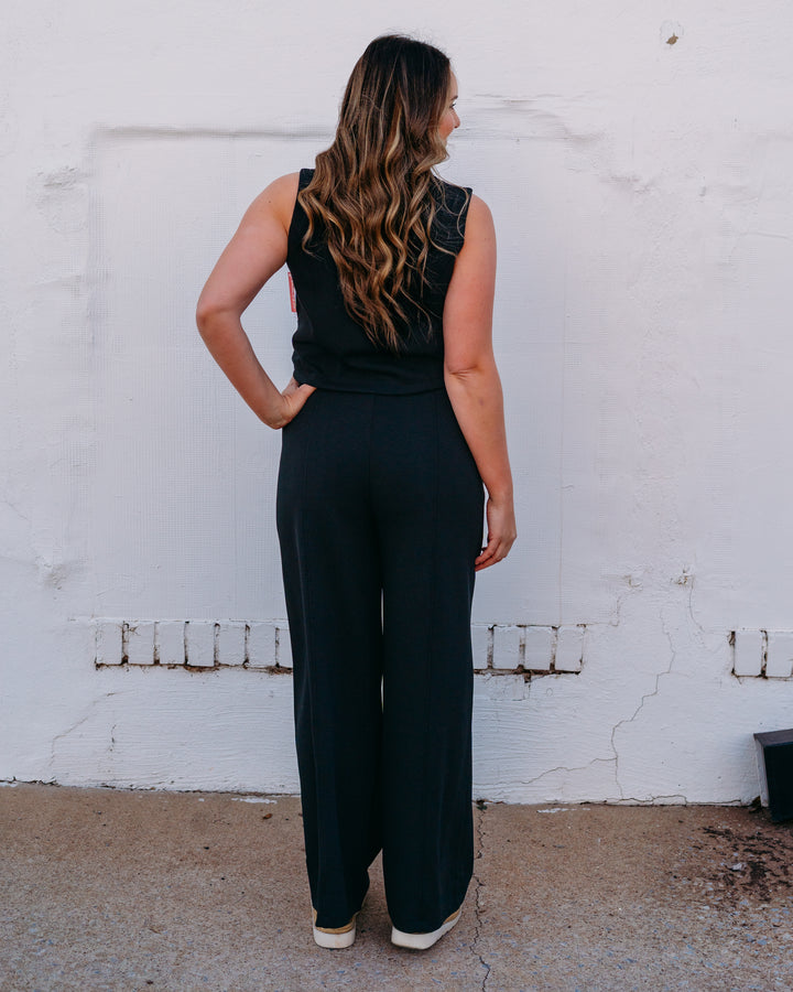 Spanx: Airessentials® Shawl Collar Half Zip Jumpsuit in Very Black (22464R) - The Vogue Boutique