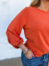 Load image into Gallery viewer, Esqualo: Model Twist Sleeve Top in Rust
