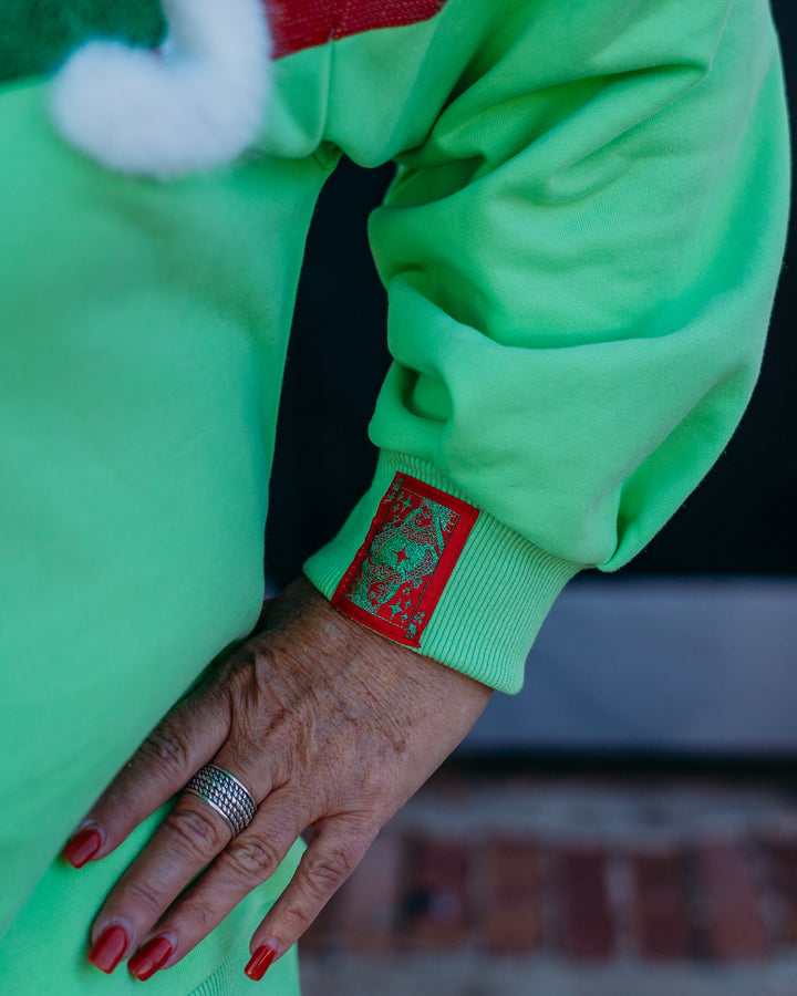 Queen Of Sparkles:Green Grinch Heart Hands Sweatshirt