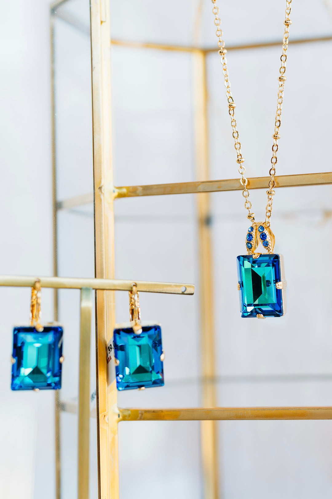 Mariana: Gold Emerald Cut Earrings in “Ocean”