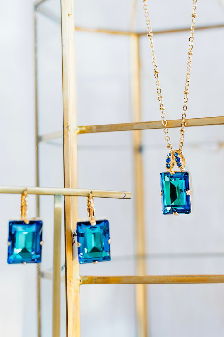 Mariana: Gold Emerald Cut Earrings in “Ocean”