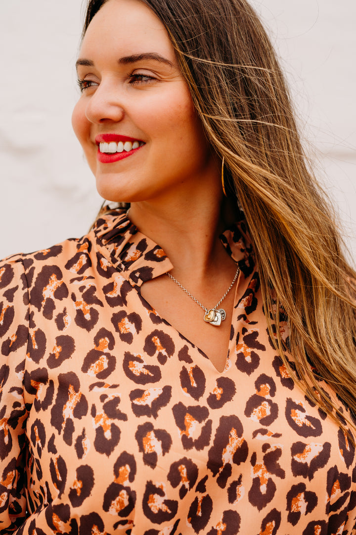 Joy Joy: Split Neck Flounce Dress in Brown Leopard