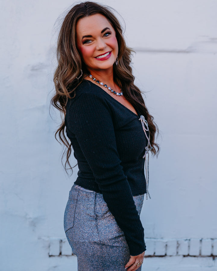 Design History: Crystal Bow Cardigan in Black