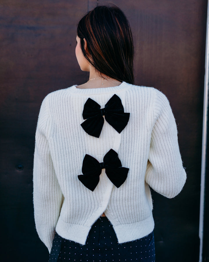 Design History: Sequin Bow Sweater in Winter White Combo