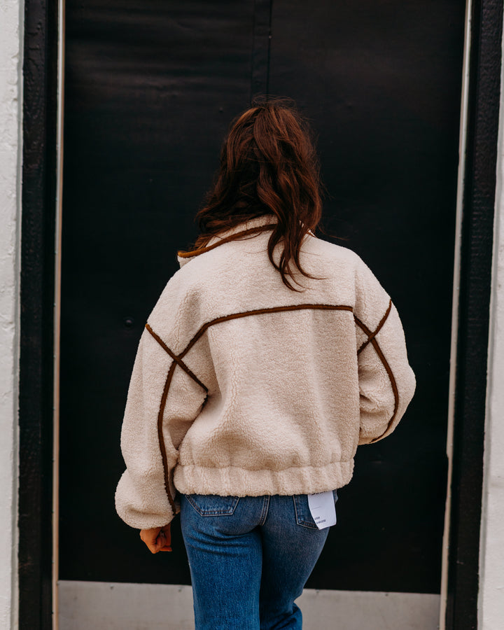 Elan: Off White Fur Jacket Brown Trim