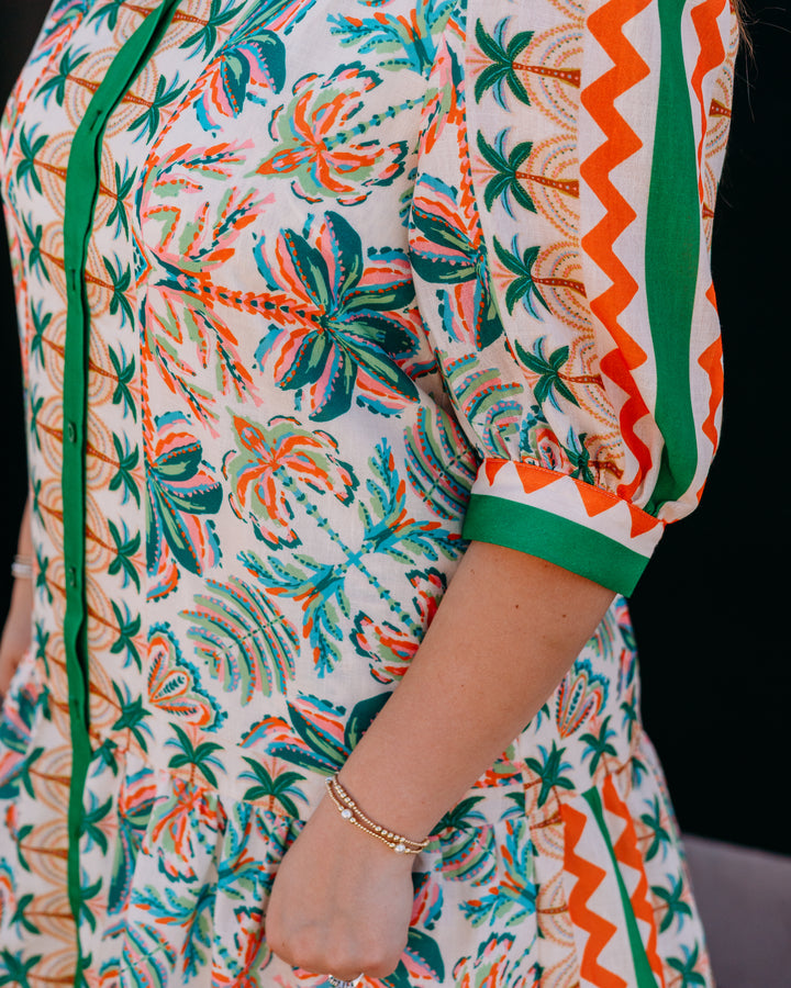 Jade: Flutter Hem Buttons Dress in Palm Fiesta (77D8054)