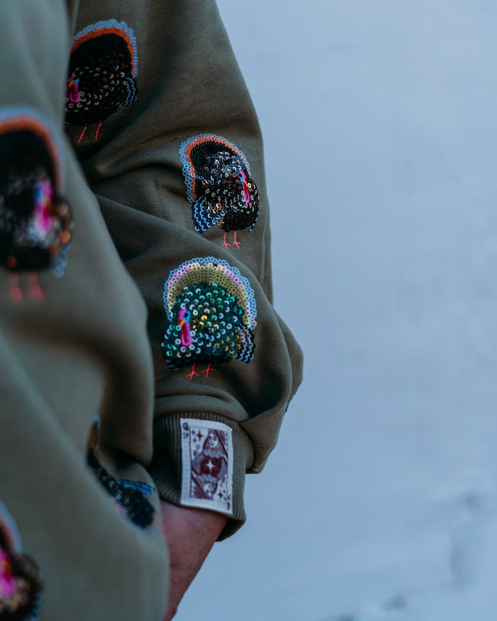 Queen of Sparkles: Scattered Turkey in Olive Green