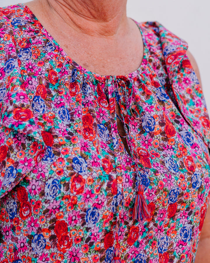 Liverpool: Flutter Sleeve Peplum Woven Top W Ties in Pink Multi - The Vogue Boutique