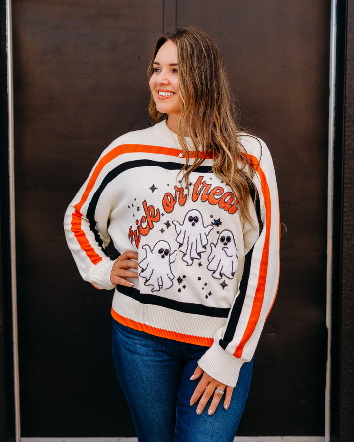 Queen of Sparkles: 'Trick or Treat' Long Sleeve Sweater in White, Black, & Orange Stripe.