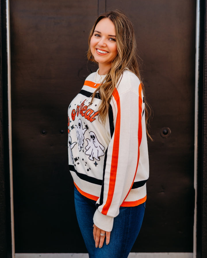 Queen of Sparkles: 'Trick or Treat' Long Sleeve Sweater in White, Black, & Orange Stripe.