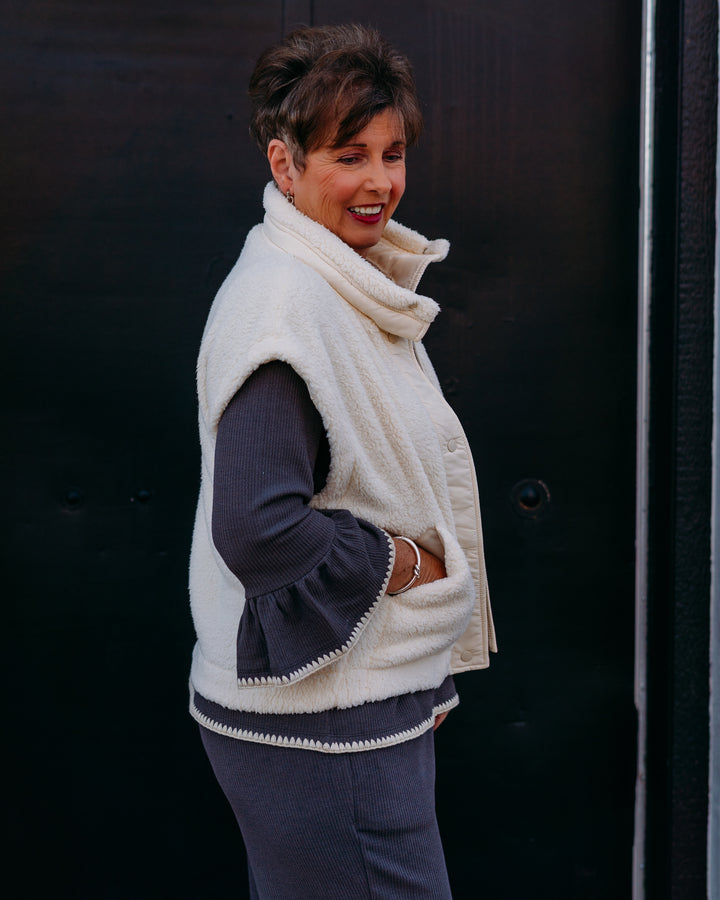 Multiples: (Snow Leopard) White Stand Collar Snap Front Jacket in Solid Faux Fur M45504VM