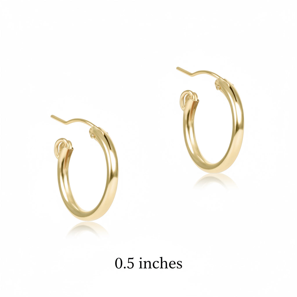 Enewton gold hoop earrings with post backs on white background