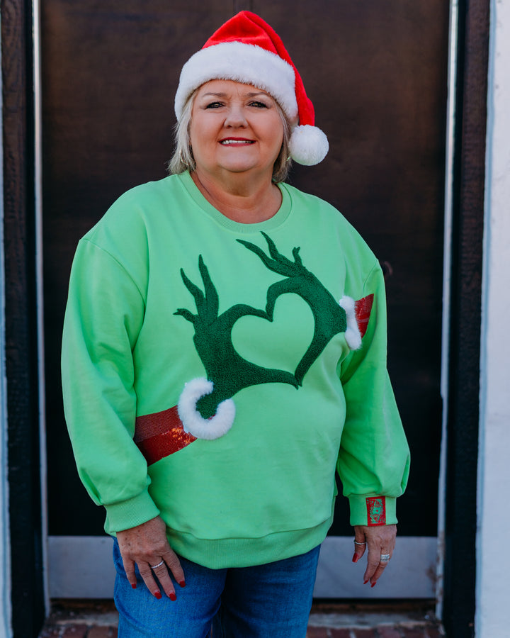 Queen Of Sparkles:Green Grinch Heart Hands Sweatshirt