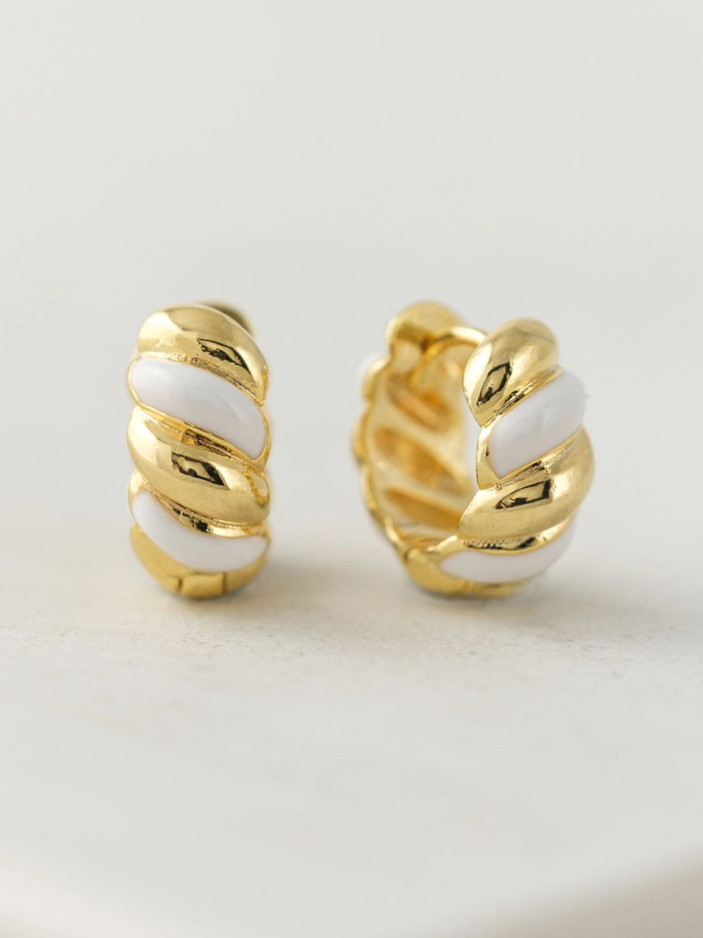 Lovers Tempo: Croissant Enamel Huggie Hoops Earrings in Gold/White