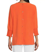 Load image into Gallery viewer, Multiples: Multi-Shirred Short Sleeve Wide Neck Faux Button Back Solid Crinkle Woven Top in Bright Melon M24509TM
