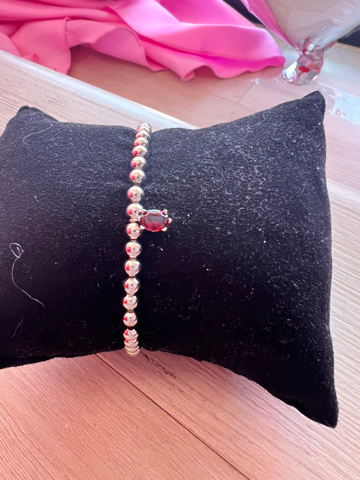 Kendra Scott: Cailin Stretch Bracelet in Silver Red Crystal - The Vogue Boutique