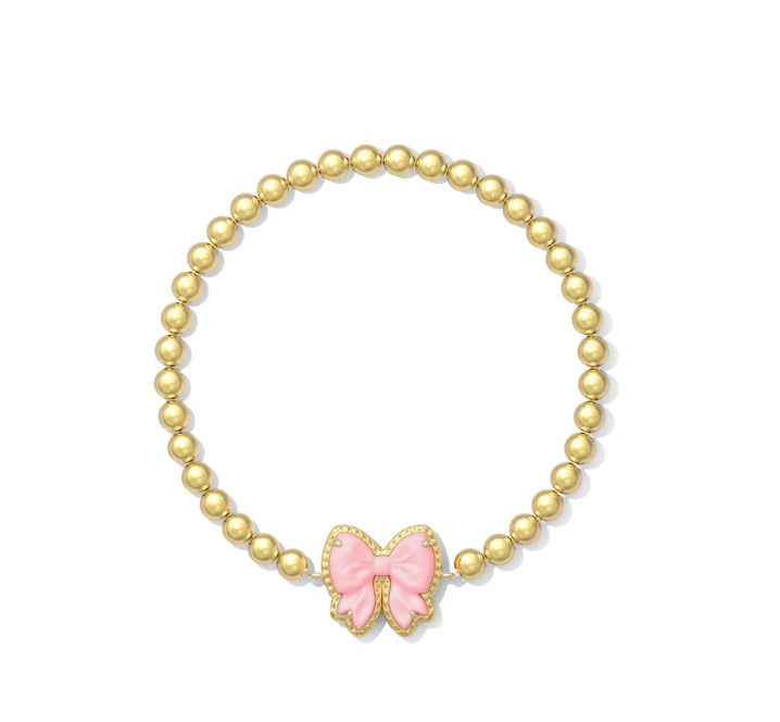 Kendra Scott: Haley Bow Stretch Bracelet in Gold Blush Ivory Mother Of Pearl