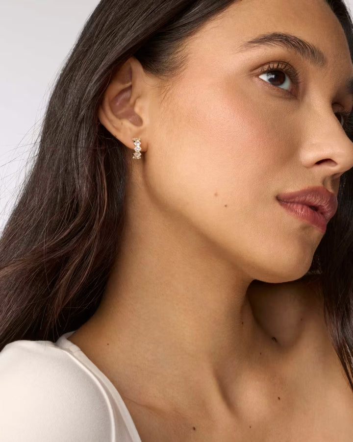 Kendra Scott: Cailin Gold Crystal Huggie Earrings in White Crystal