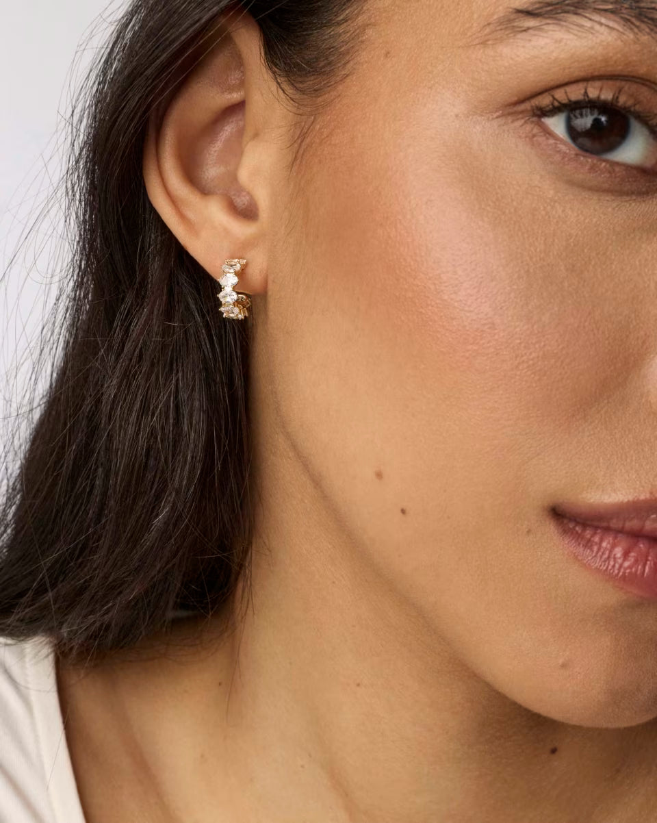 Kendra Scott: Cailin Gold Crystal Huggie Earrings in White Crystal