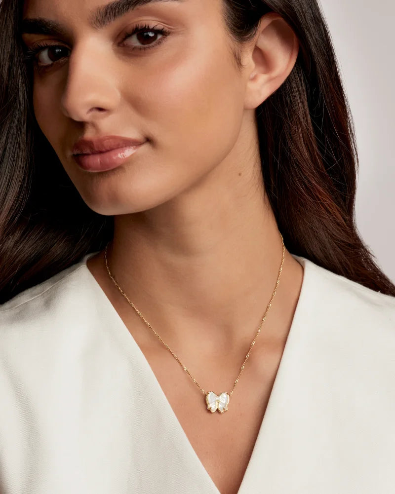 Kendra Scott: Haley Bow Short Pendant Necklace in Gold Ivory MOP