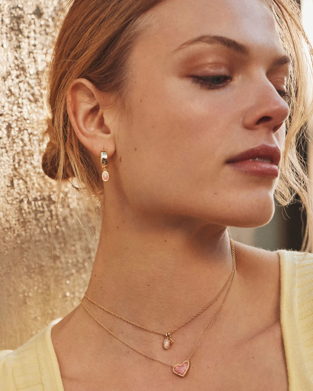 Kendra Scott: Mini Ellie Wide Huggie Earrings in Gold Light Pink Lab Grown Opal