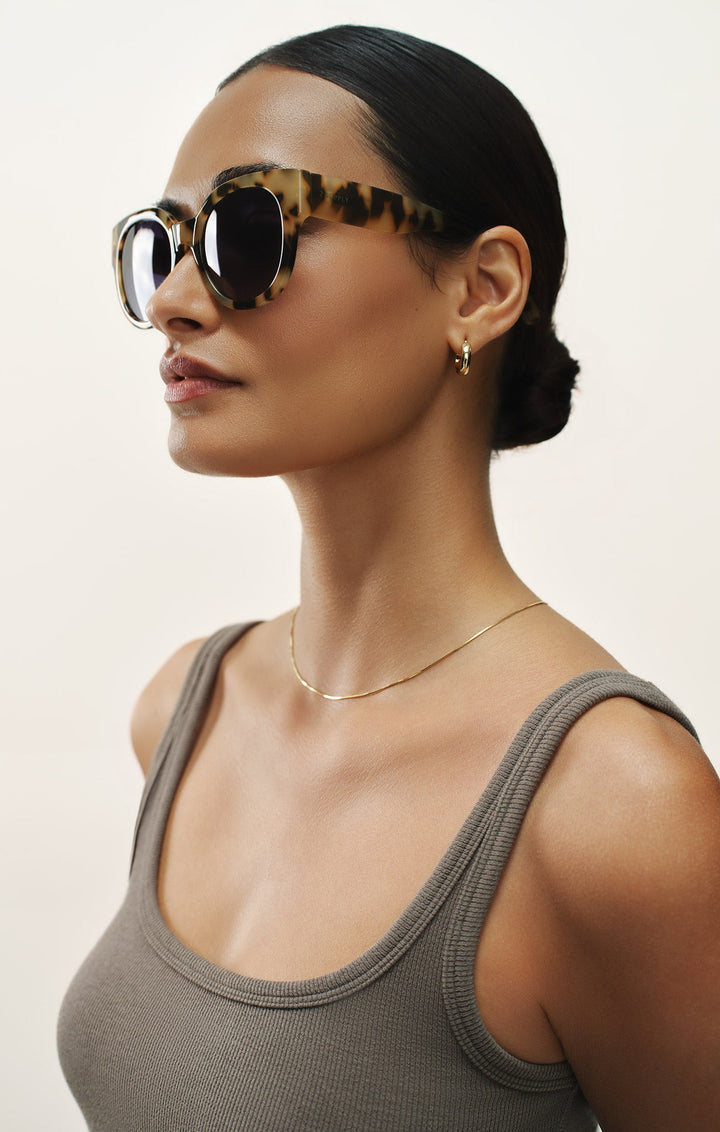 Woman wearing Z Supply Lunch Date Dark Tort gradient polarized oversized sunglasses with tortoiseshell frames