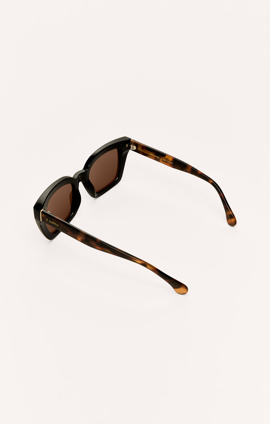 Z Supply Hideaway sunglasses in dark tortoise with brown gradient polarized lenses, angled side view