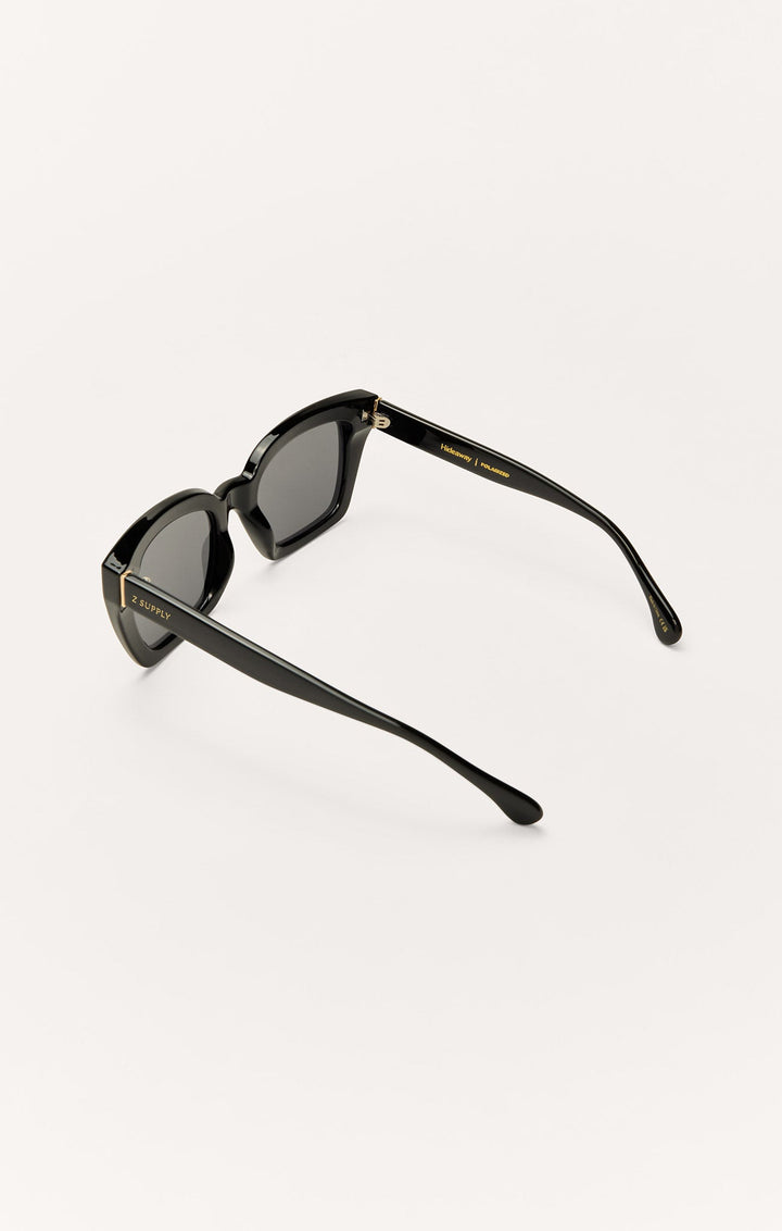 Z Supply Hideaway polarized sunglasses in polished black with grey lenses, side view