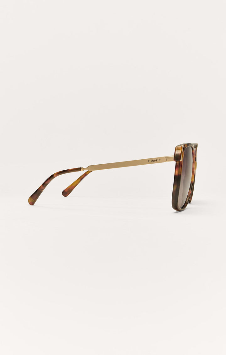 Z Supply Riviera sunglasses side view showing gold temple arm and brown tortoise frame