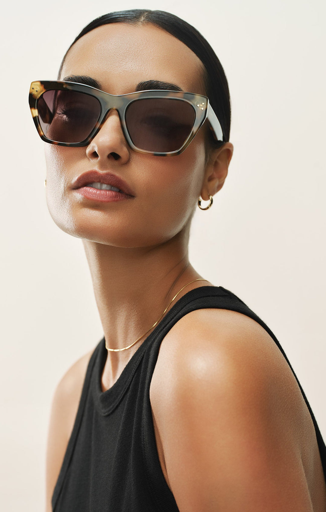 Model wearing Park Ave Brown Tortoise-Grey oversized cat-eye sunglasses by Z Supply