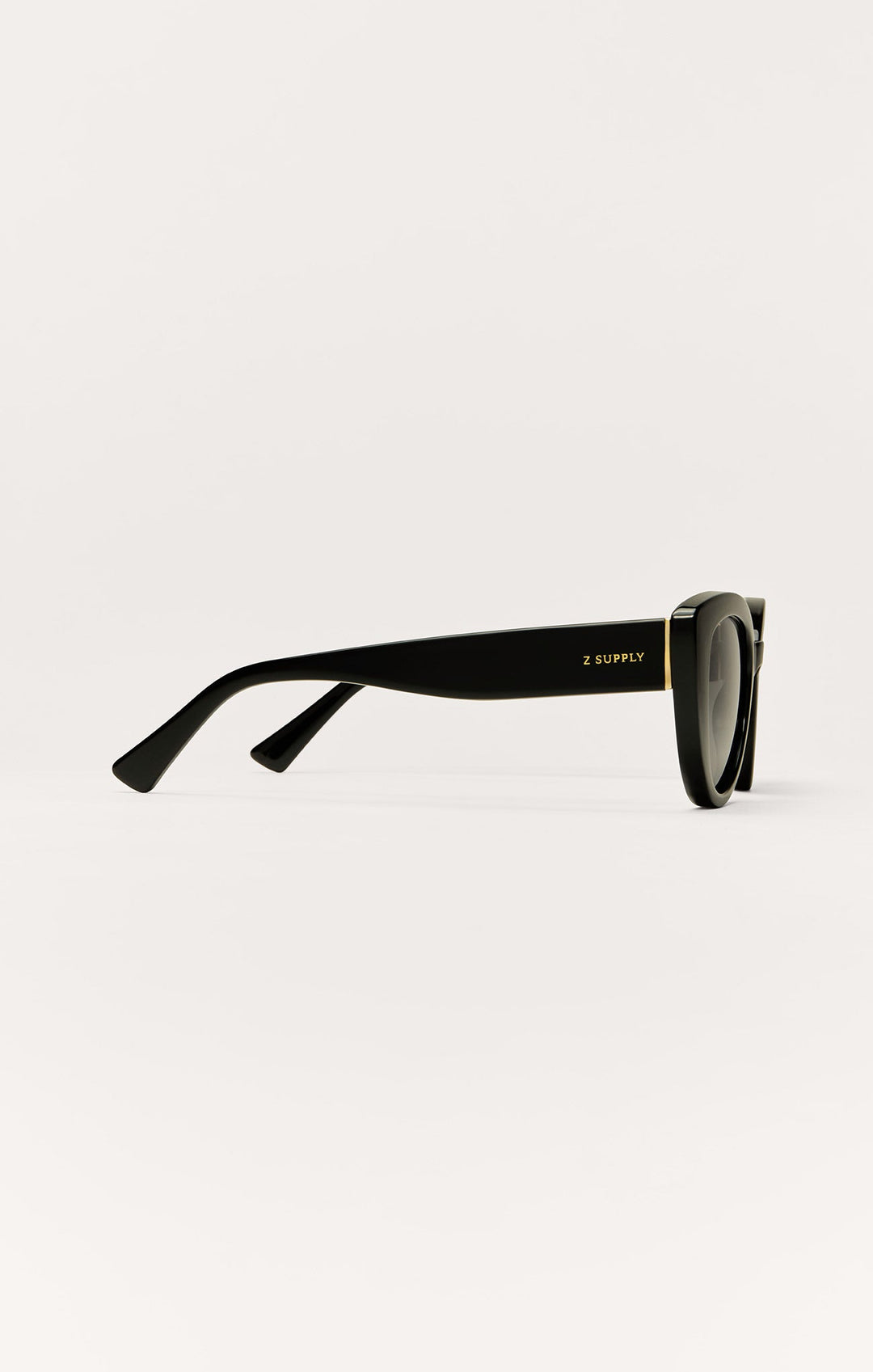 Z Supply Golden Hour sunglasses in polished black with grey polarized lenses, side profile view