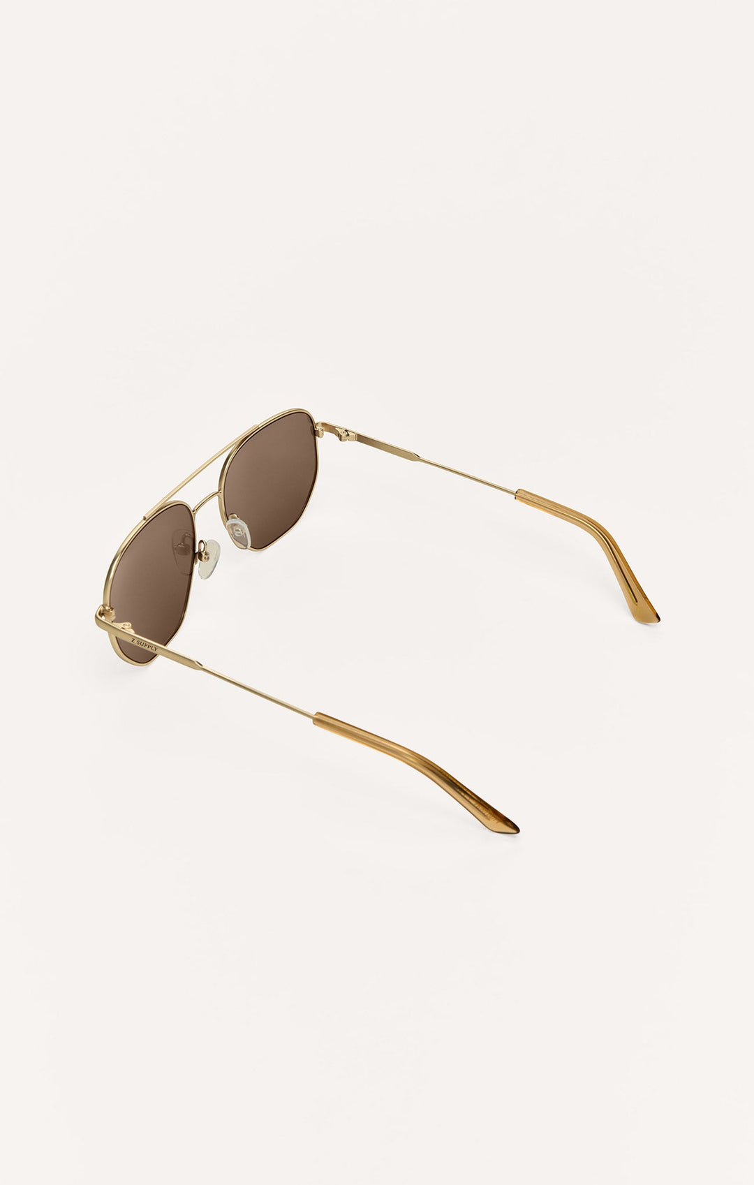 Z Supply Highway sunglasses in gold metal frame with brown gradient polarized lenses, angled back view