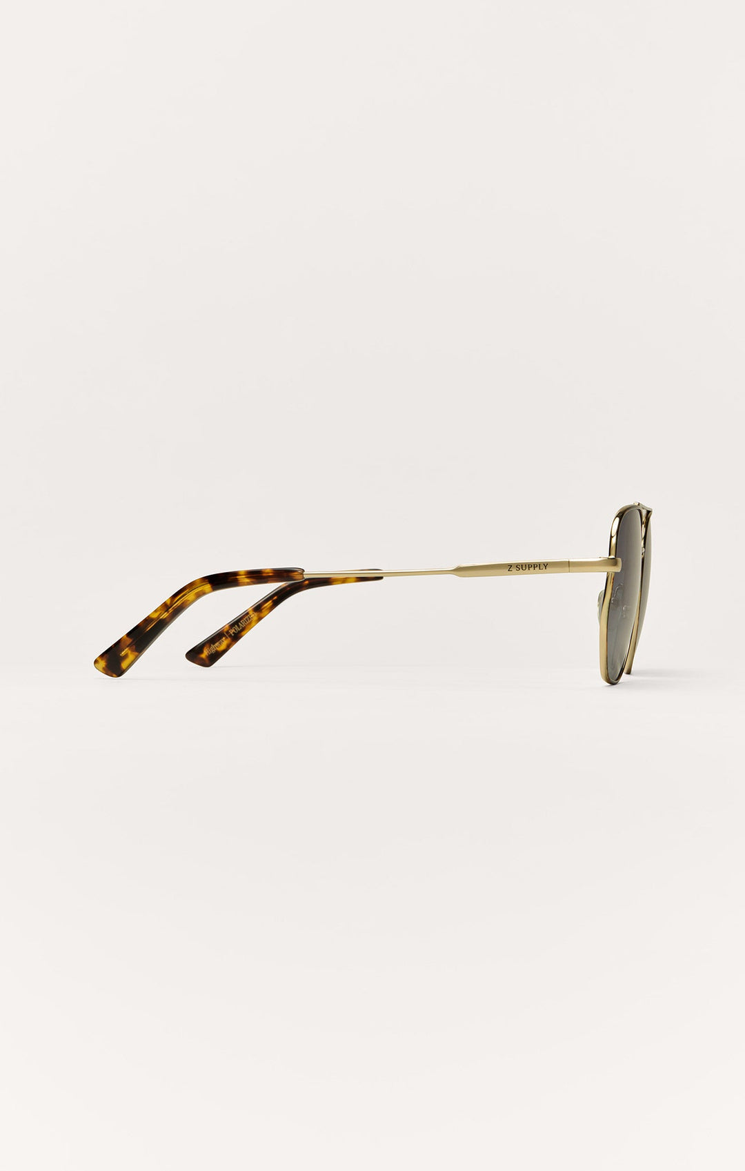 Z Supply Highway sunglasses in satin gold with tortoise temples and brown polarized lenses, side view