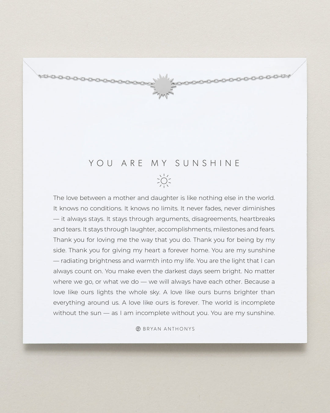 Bryan Anthonys You Are My Sunshine necklace with sun pendant on chain